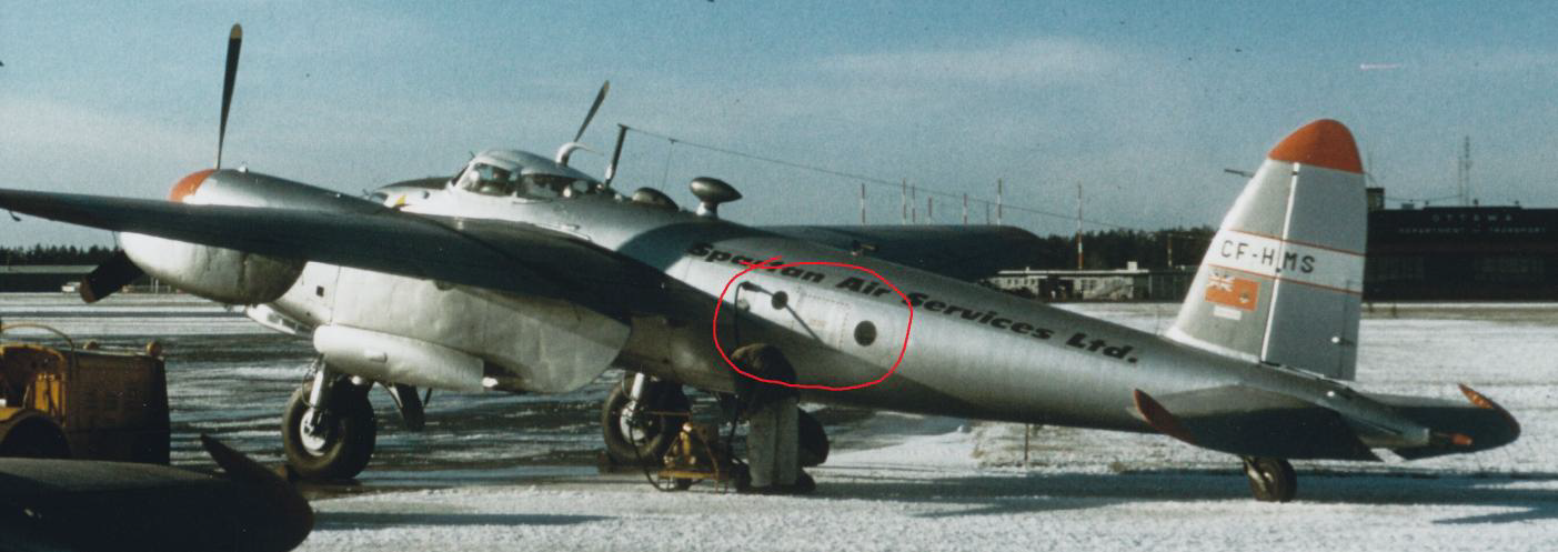 1958 photo showing the Spartan modifications to the rear fuselage. These were added to give the camera operator some natural light. The forward porthole was patched over in a previous restoration attempt.